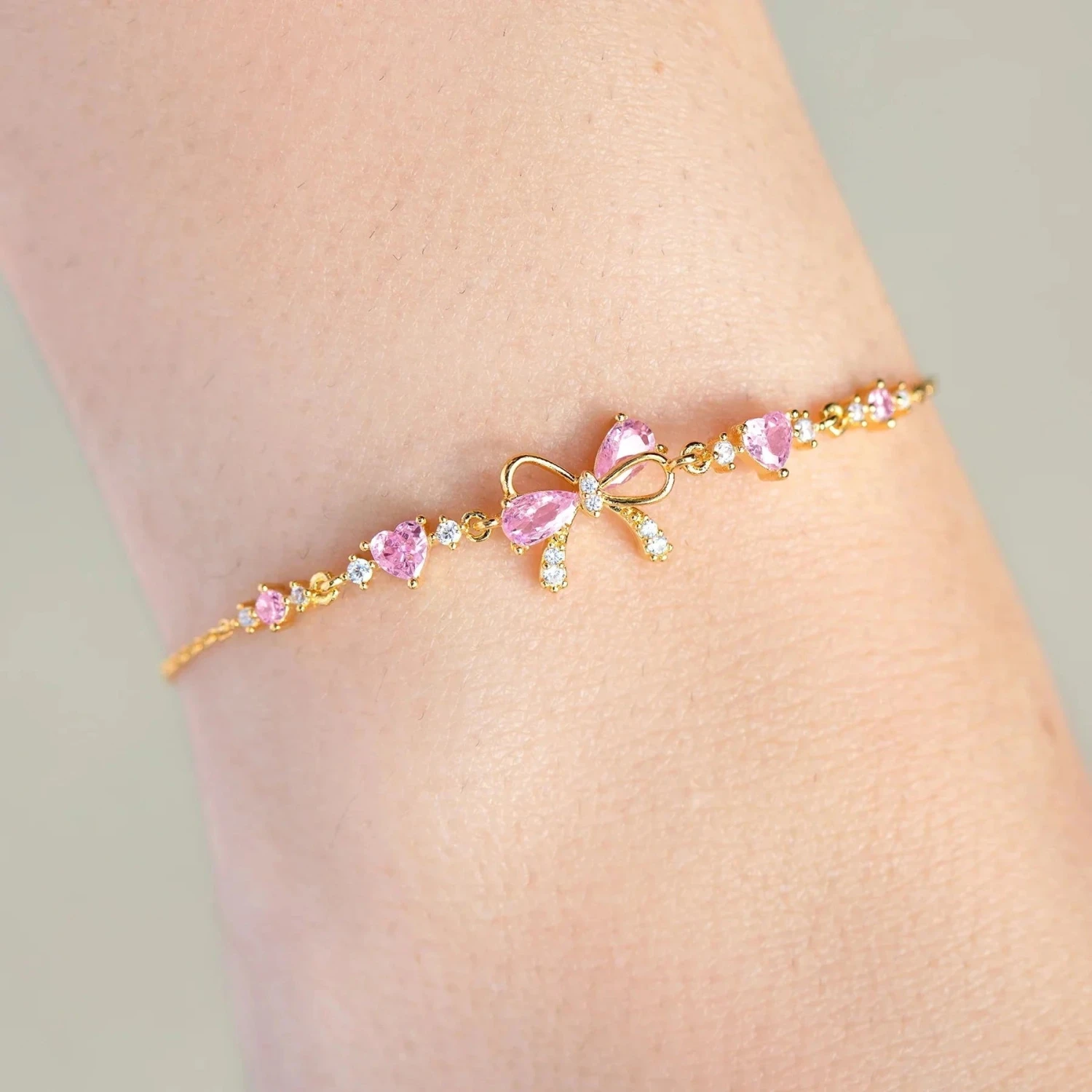 Hearty Pink & Gold Bow Bracelet - Image 2